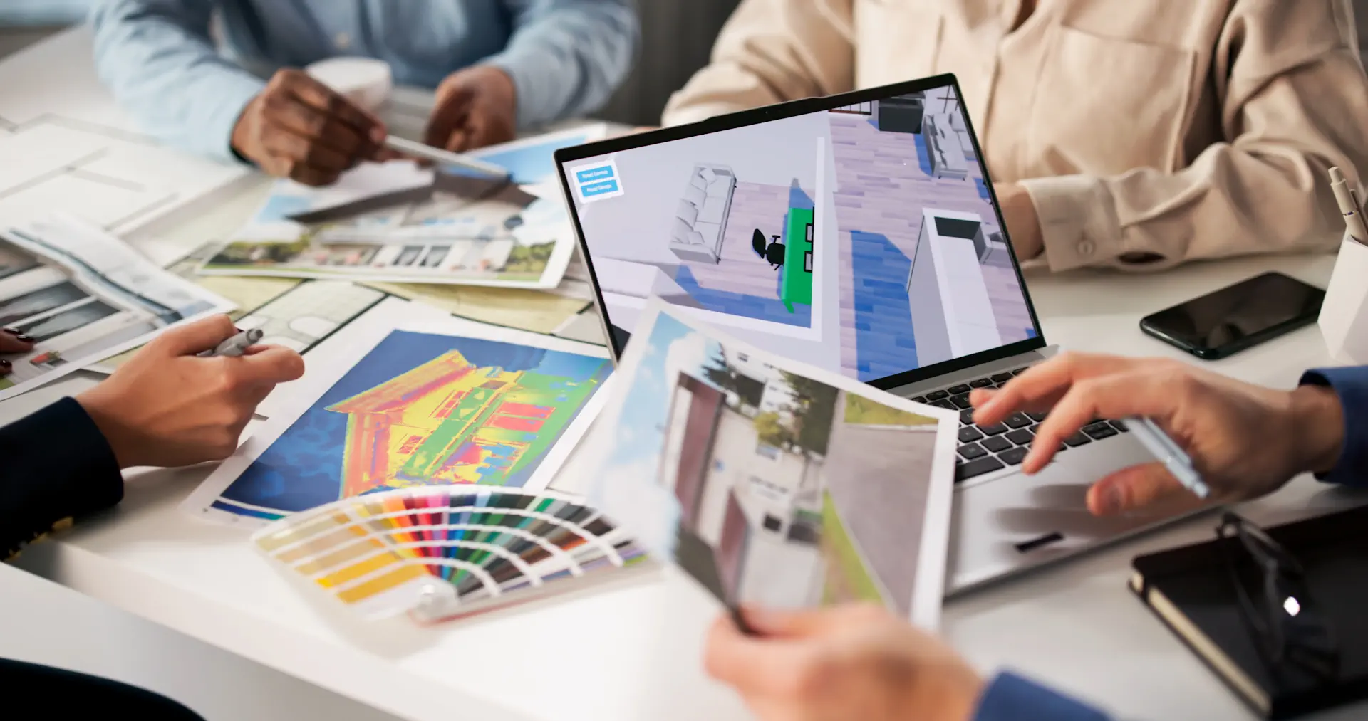 Kitchen designer reviewing remodeling plans and material selections with homeowners