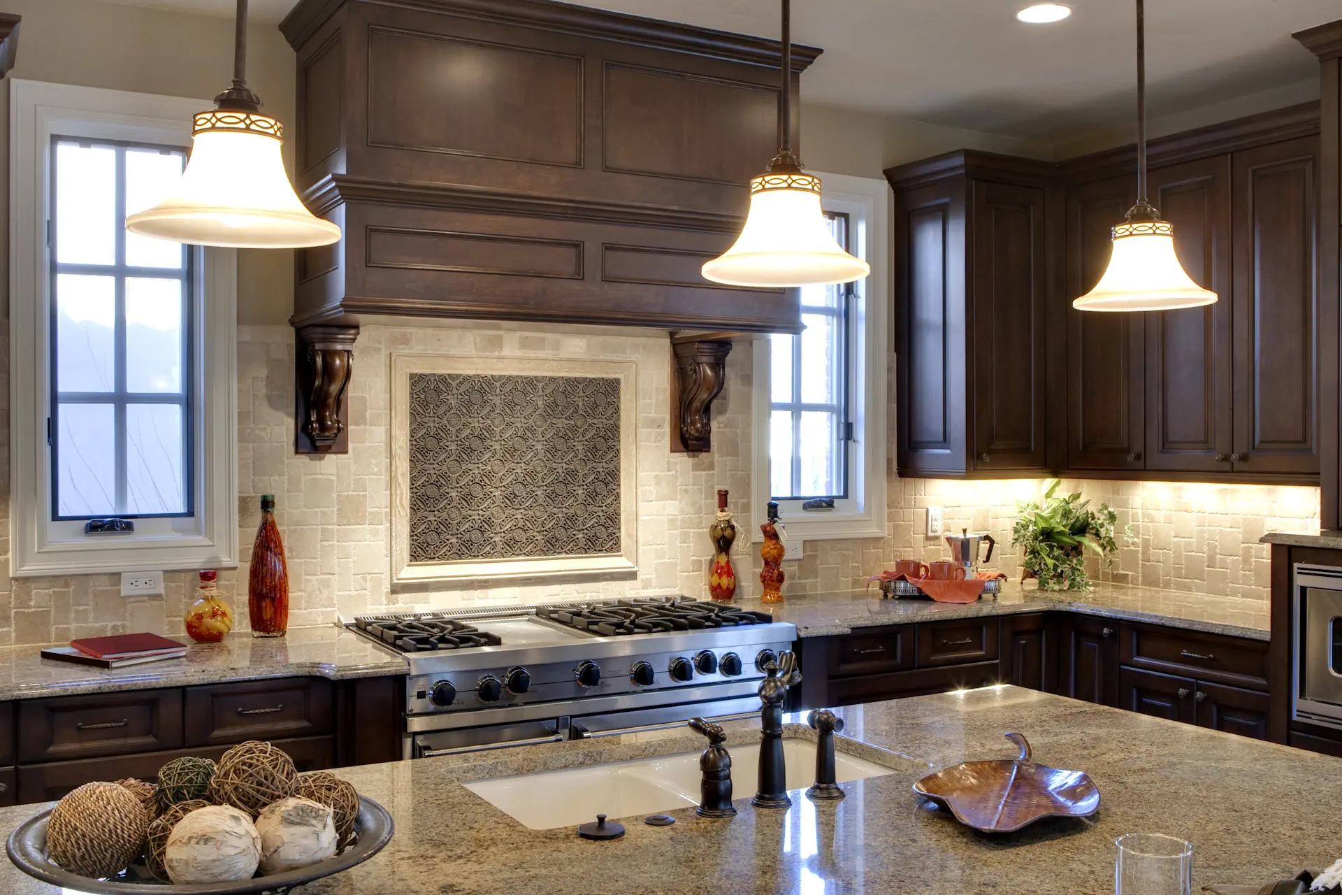 Custom kitchen island with seating, storage, and workspace