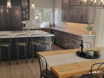 Modern Kitchen With Marble Top Island