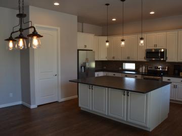 Kitchen Installed In Black Forest Custom Home With Cabinets