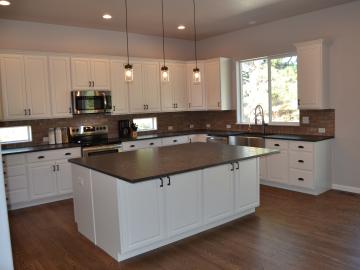 Kitchen Installed In Black Forest Custom Home With Custom Cabinets