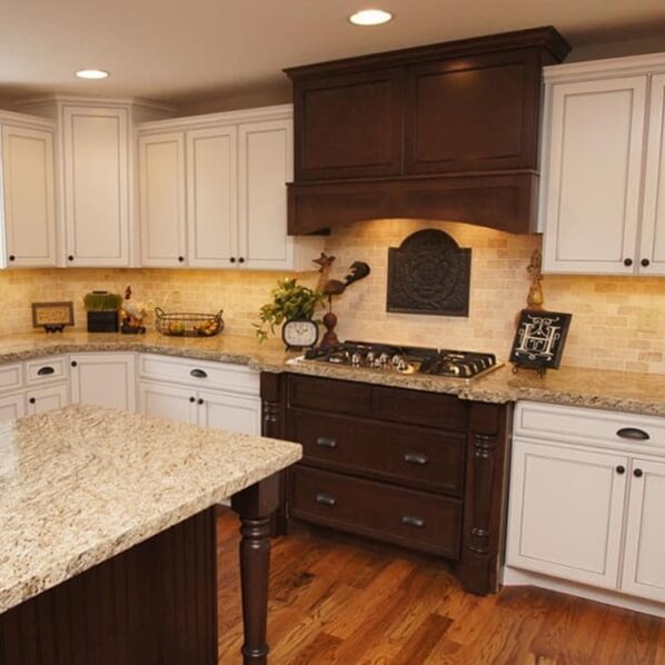 Decorative vent hood matches the rest of the kitchen cabinetry